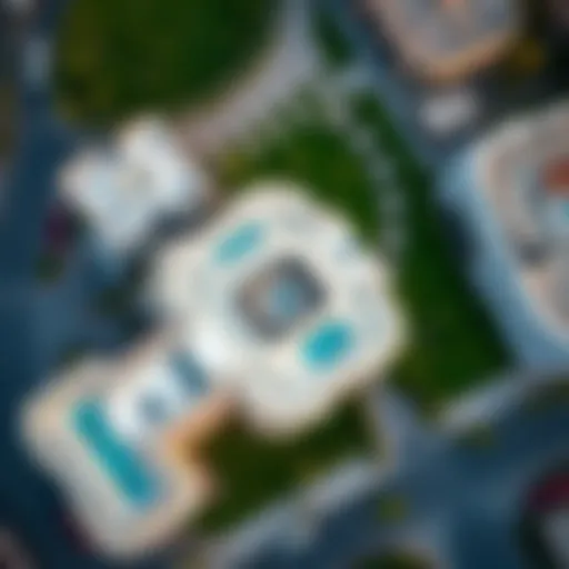 Aerial view of Al Waha, showcasing its modern architecture and green spaces