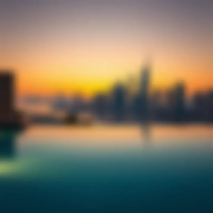 An elegant infinity pool overlooking the Dubai skyline at sunset