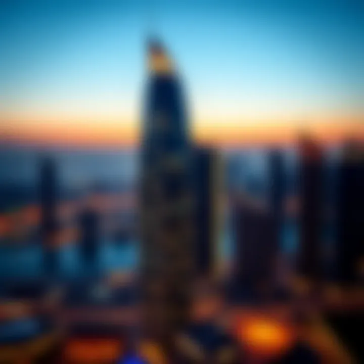 Night view of Millennium Tower illuminated against the Dubai skyline